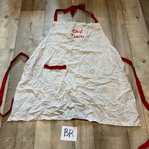 White Apron with Red Ties chef Travis embroidered name